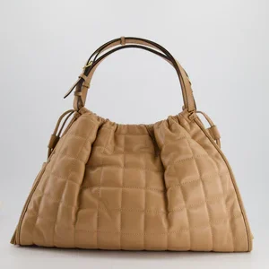 gucci beige quilted leather shoulder bag dual tone hardware and leather tassels